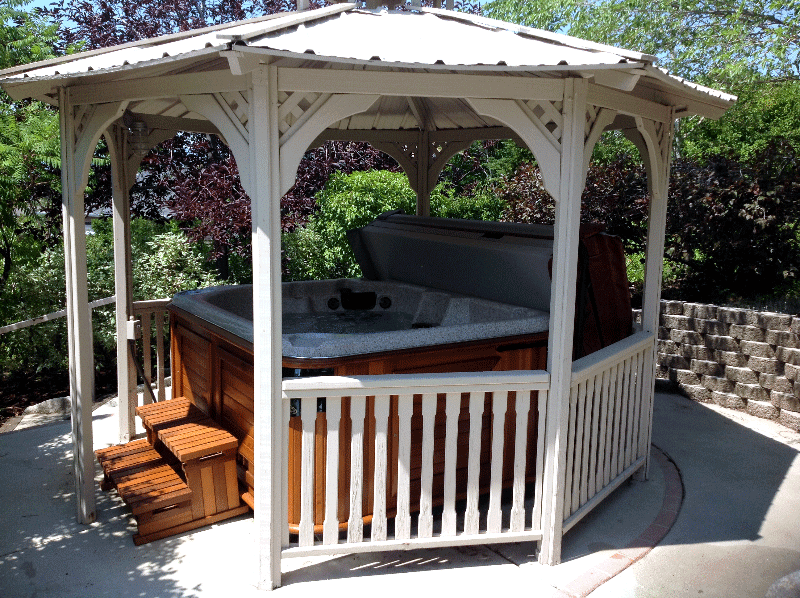 Arctic Spas hot tub on patio covered with gazebo